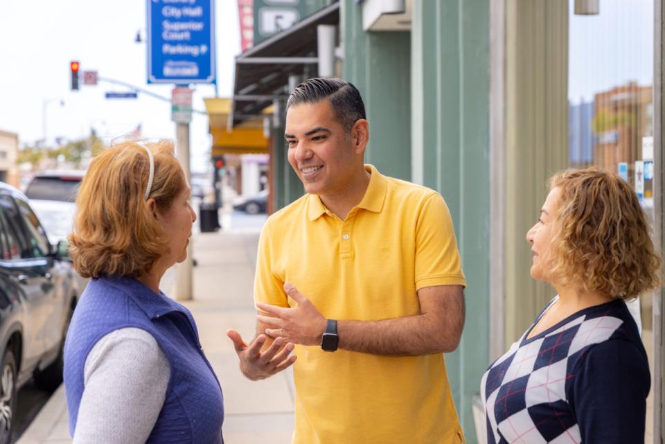 Congressman Garcia talking to constituents